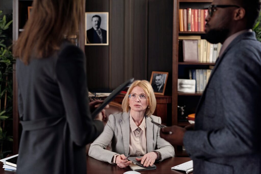 Free Lawyers Talking in an Office Stock Photo