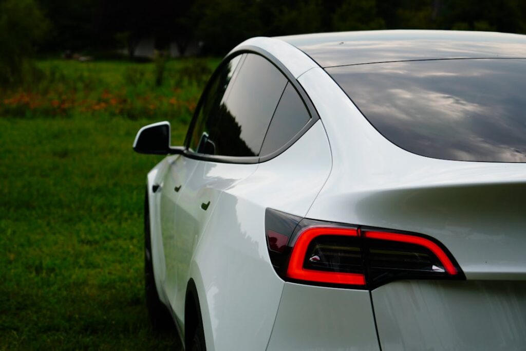 Free Back View of White Tesla Model Y Stock Photo